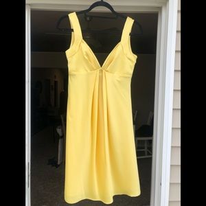Calvin Klein yellow satin, size 2, “u” open back back dress